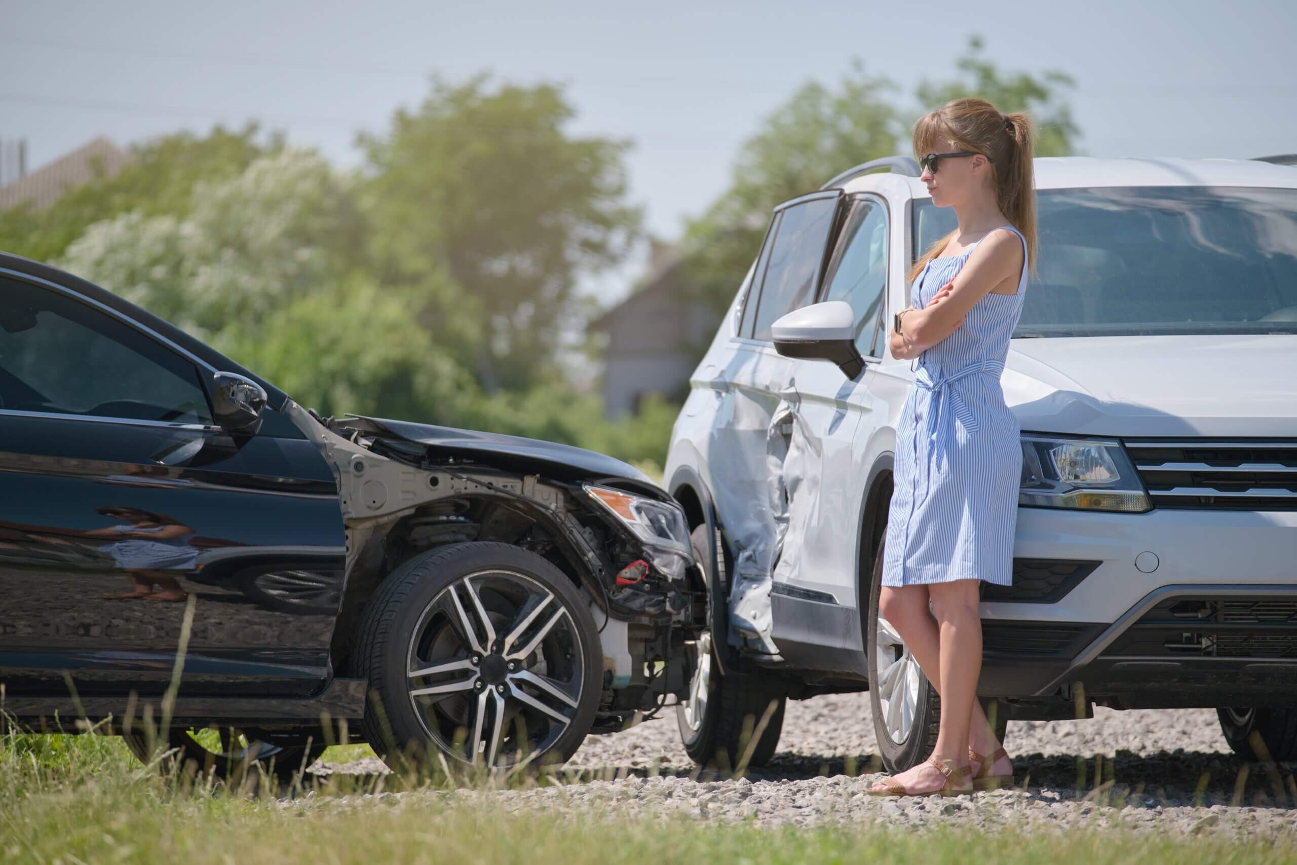 Stressed,Woman,Driver,Standing,On,Street,Side,Shocked,After,Car