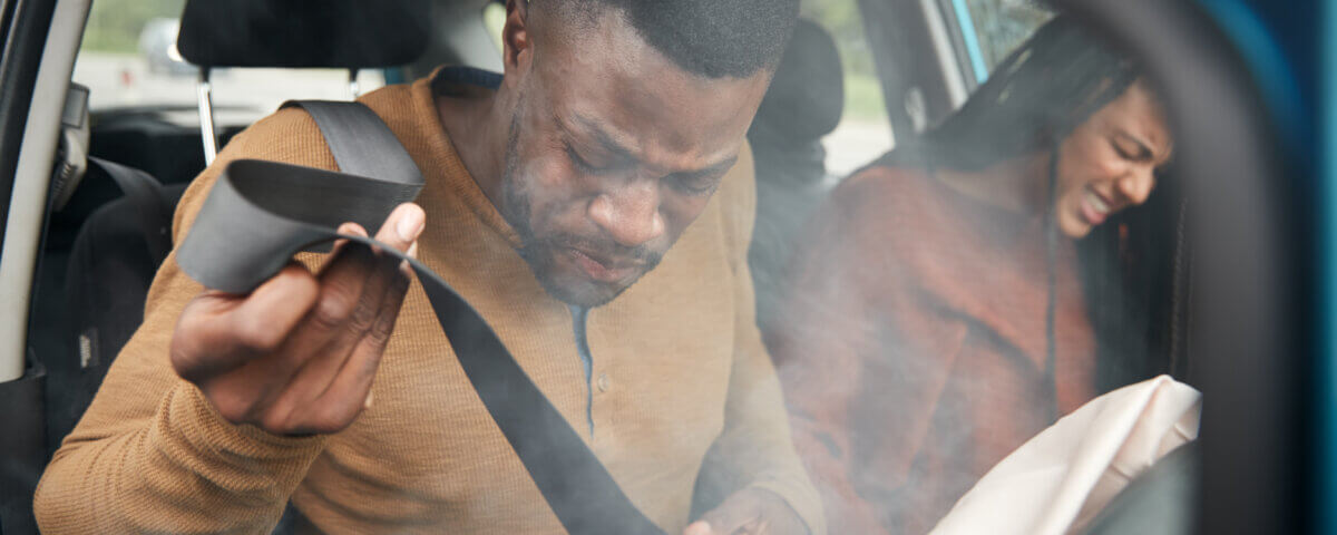 How a Passenger Can Minimize Harm in a Car Crash