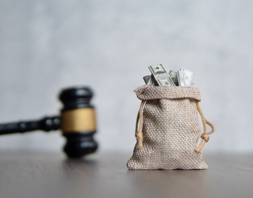Should You File a Lawsuit or Accept a Settlement? Pros and Cons to Consider