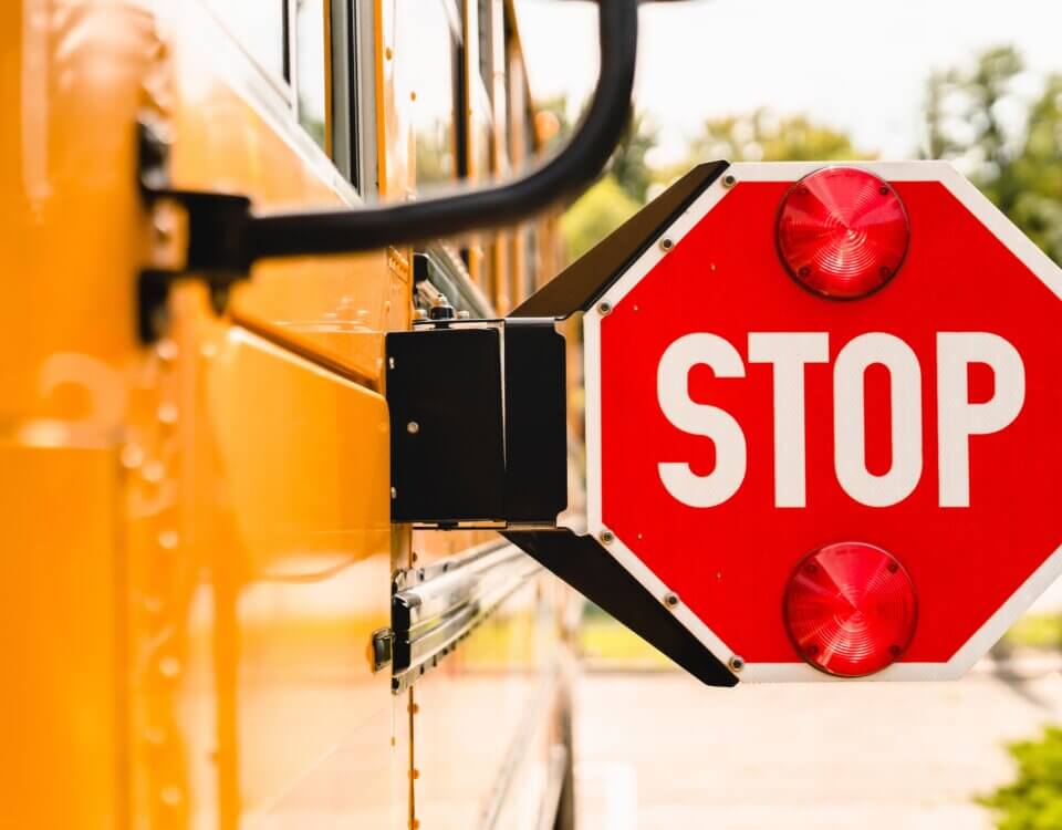 Penalties and Risks for Failing to Stop for a School Bus in California